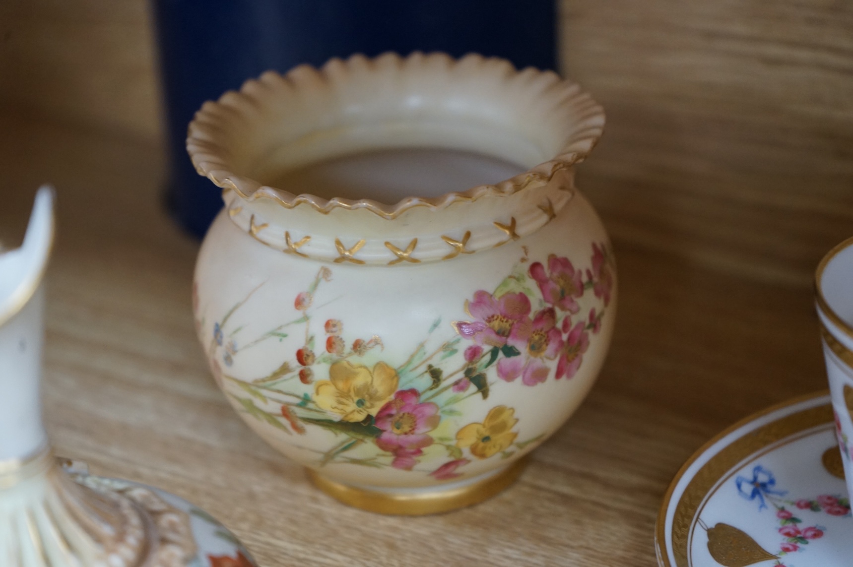 A Worcester butterfly handled cup and saucer and four other items, together with Royal Crown Derby, Dresden and Coalport items. (9). Tallest 13 cm